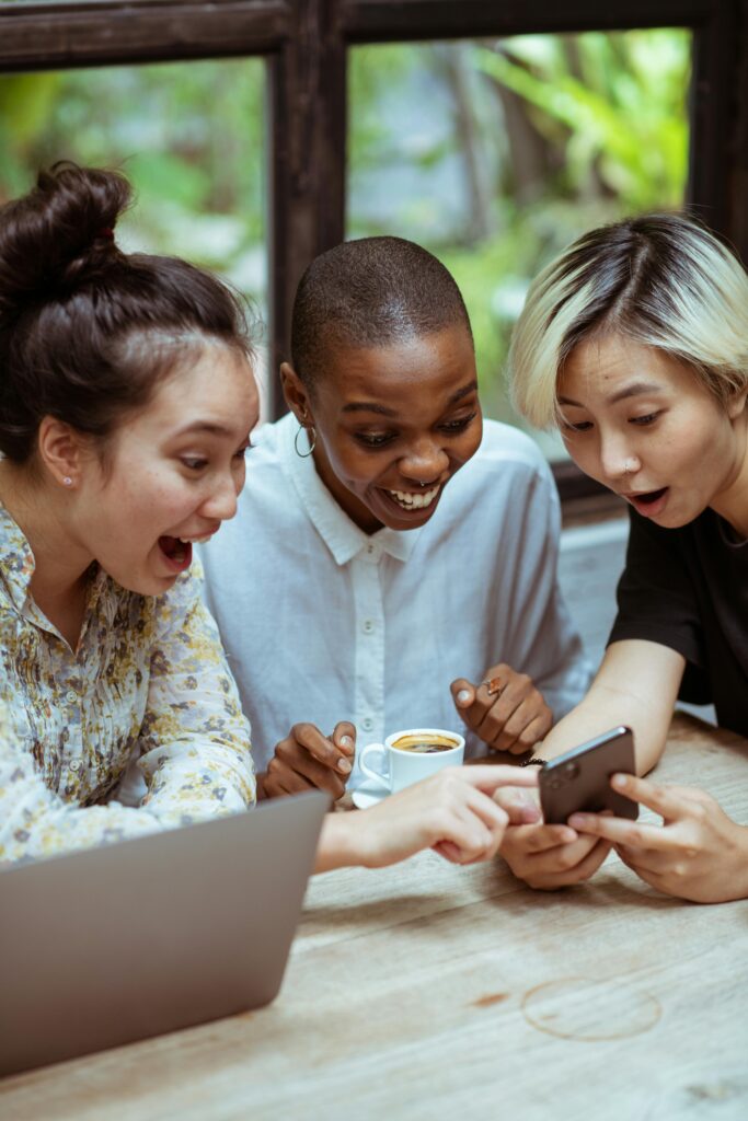 Friends looking at phone